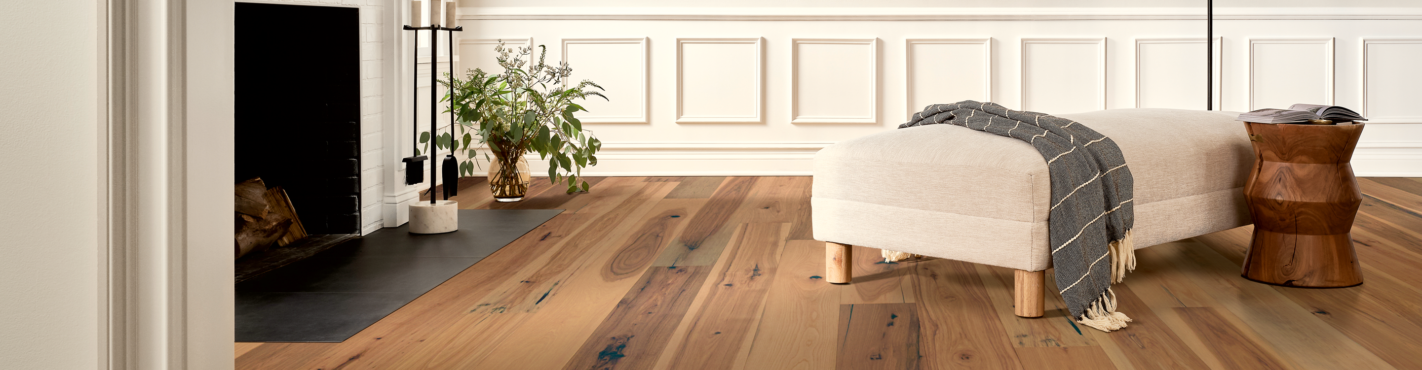 Living room with hardwood flooring in Flint, MI, and fireplace